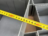 a measuring tape that is on top of a metal box