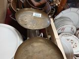 a lot of dishes and pans that are on the table