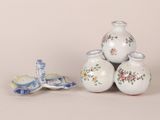 three vases sitting on top of each other on a table
