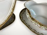 two bowls and a saucer sitting on a table