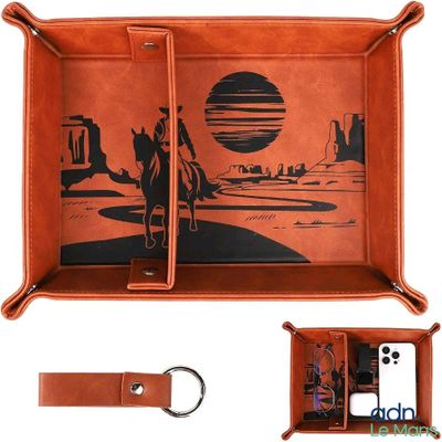 an image of a brown leather tray with a picture of a man riding a horse