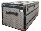 an image of a louis vuitton trunk on a white background