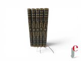 three books are stacked on top of each other on a white surface