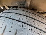a close up view of a tire on a vehicle