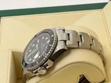 a watch that is in a box on the table