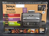 a box with a grill inside of it on a table