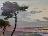 a painting of two trees on the shore of the ocean