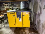a yellow machine that is sitting in a room