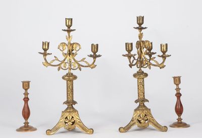 pair of antique brass candelabs with candlesticks on stands