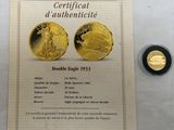 a gold coin with a certificate on it next to a gold coin