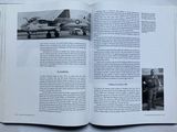 an open book with a picture of a fighter jet on it
