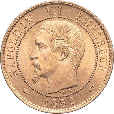 une image montrant un gros plan d'une pièce de monnaie sur laquelle figure le visage d'un homme