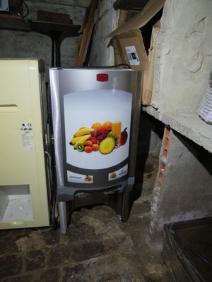 a refrigerator that has a bunch of fruit in it