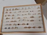 a display of various rings and bracelets on a table