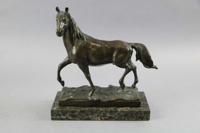 bronze statue of a horse on a marble base on a white background
