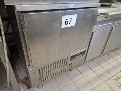 a stainless steel counter top with a number on it