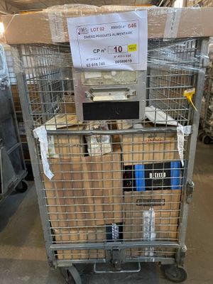 a metal cart with a lot of boxes on top of it