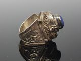 an image of a silver ring with a lapis stone in it