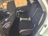 the back seats of a car are empty and the passenger seat is empty