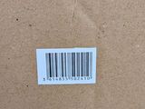 a box with a barcode on it sitting on a table