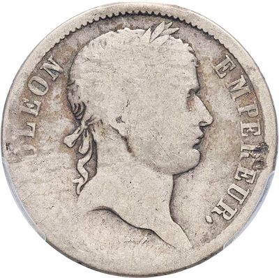 a close up of a coin with a woman ' s face on it