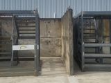 two metal stairs that are next to each other