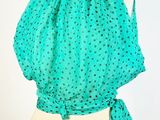 a close up of a green scarf on a mannequin mannequin mannequin mannequin mannequin mannequin mannequin manne