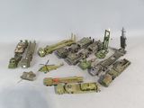 a lot of military toys that are on a white surface
