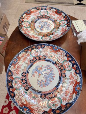 two plates that are sitting on a table