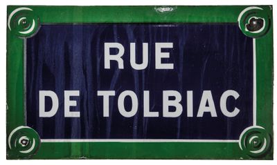blue and green sign with white writing on it saying rue de tolbiac