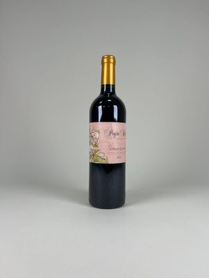 a bottle of wine that is sitting on a table