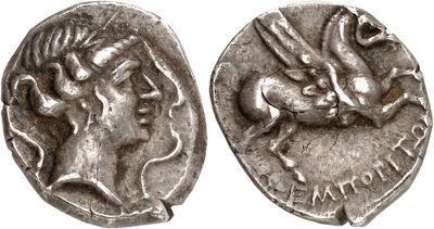 a silver coin with an image of a woman and a man on it