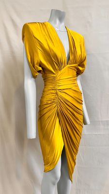 a yellow dress on a mannequin mannequin mannequin mannequin mannequin mann