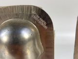 two metal bookends that have a man in a helmet on them