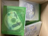 three dvds in a box that are sitting in a box