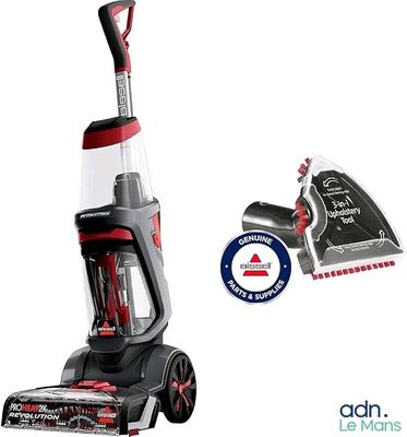 un gros plan sur un aspirateur et une brosse de nettoyage