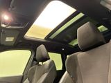 a view of the sunroof of a car from the inside