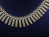 a close up of a necklace on a mannequin mannequin mannequin mannequin mannequin mannequin mannequin mannequin