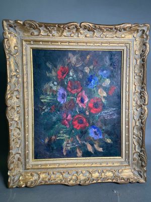 painting of a bouquet of flowers in a gold frame on a gray background