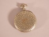 a small silver locke with a chain hanging from it