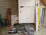 a room with a lot of tools on the floor