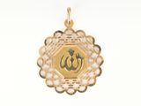 an image of a gold plated pendant with an om symbol