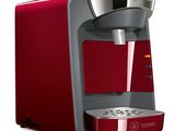 a close up of a red coffee maker on a white background