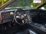 dashboard of a car with a steering wheel and dashboard controls