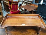 a wooden tray that is sitting on top of a table
