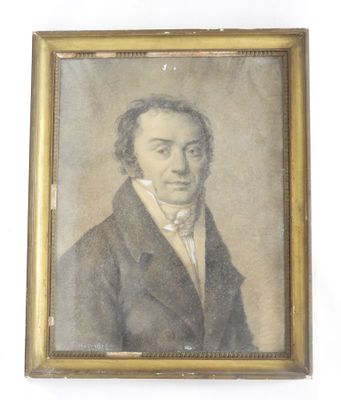 an old picture of a man in a suit and bow tie