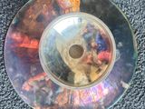 une image représentant un disque sur lequel figure l'image d'un chat