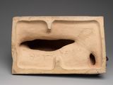 an image of a clay sculpture of a man ' s face