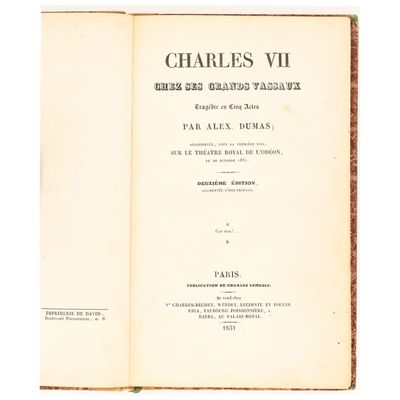 un livre ouvert à une page où figure une image de Charles VI