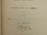 an old book with a handwritten title on it